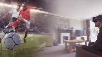 Man watches professional soccer through VR headset in living room